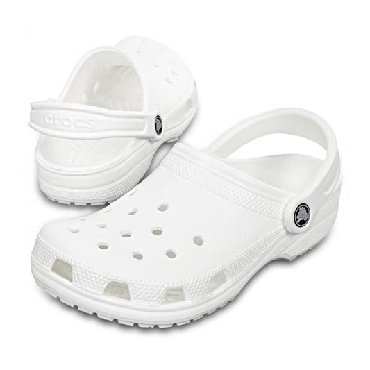 A pair of Crocs - Classic Clog White Adults Womens & Mens with ventilation holes and adjustable heel straps, shown against a plain white background.