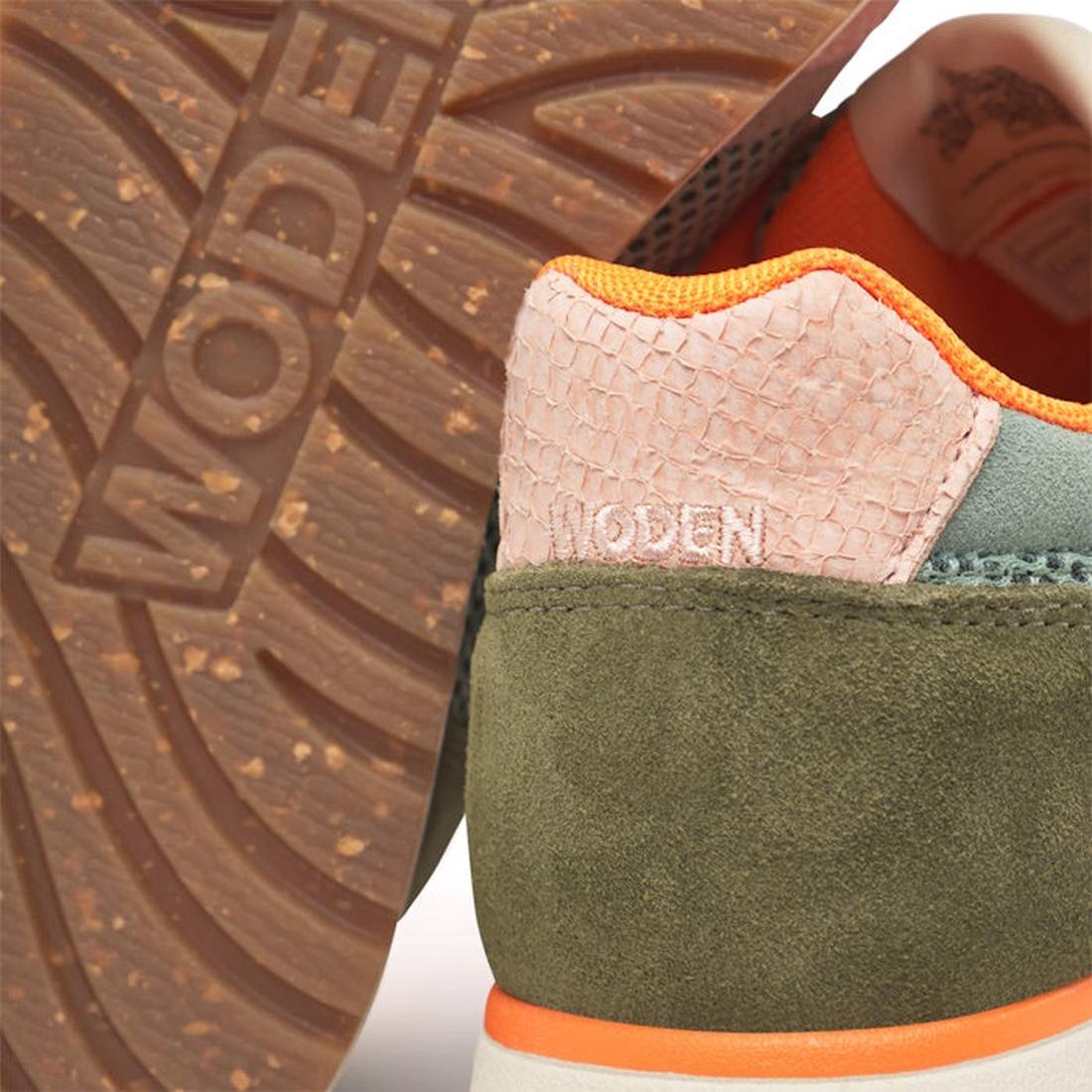 Close-up of the Woden Ronja Icon Light Algae Multi Lace Up Sneaker, featuring certified green suede, a textured pale pink heel, orange inner lining, and Woden branding embossed on the rubber sole and stitched on the heel., 50275, 5713326699838, 5713326699