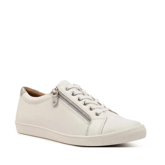 The Ziera Diann White Silver Leather Zip Women's Casual Sneaker, featuring a lace-up front, side zipper detail, rubber sole, and extra wide fit, is displayed at an angle on a plain white background.