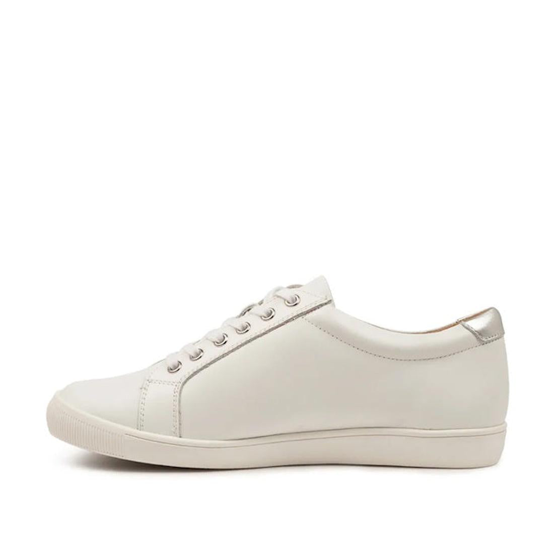 The Ziera Diann White Silver Leather Zip Women's Casual Sneaker features a minimalist white leather design, white laces, a white rubber sole, metallic silver heel accent, subtle arch support, and is shown in side profile on a plain white background., 5220