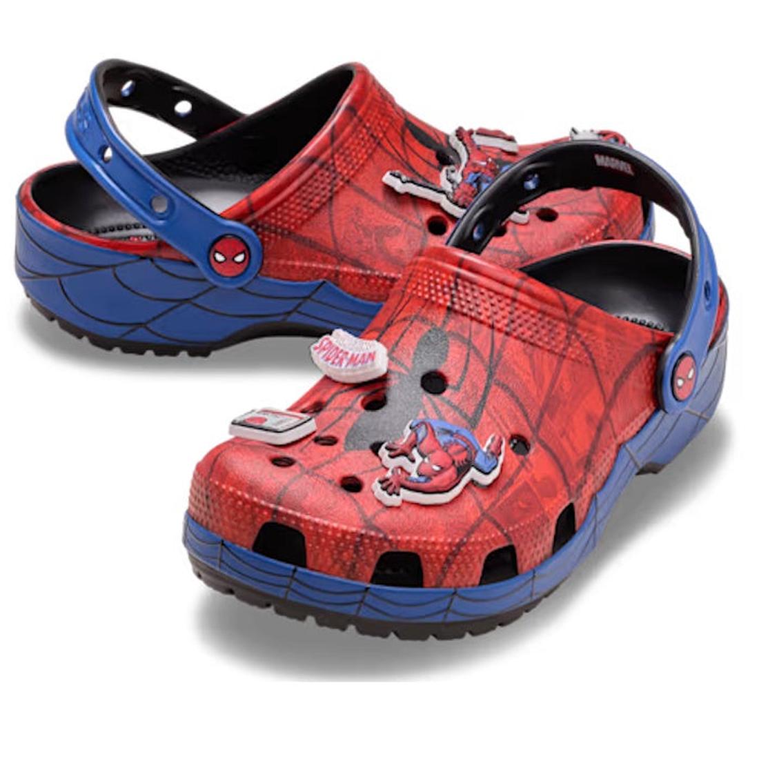 Add superhero flair to your collection with the Crocs Adults Spider-Man Web Classic Clog in red, featuring Marvel branding and fun Jibbitz charms like Spider-Man’s face and web details.
