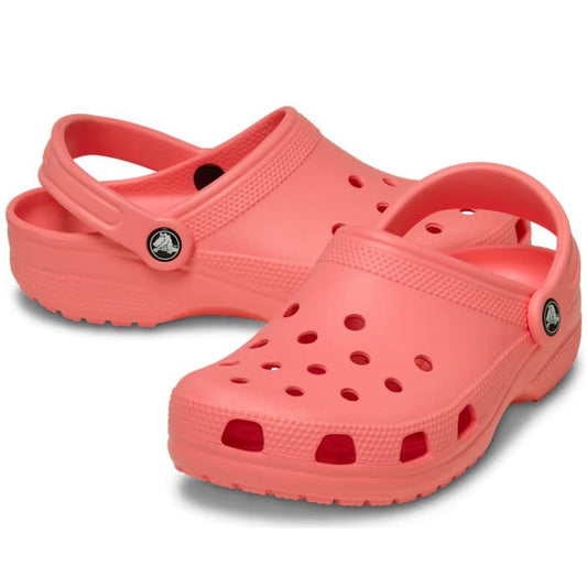 The Crocs - Classic Clog Adults Guava Pink Orange features adjustable heel straps, ventilation holes on top, and signature Crocs Comfort, all showcased on a white background.