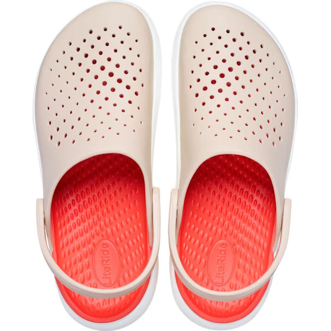 The Crocs In Motion Clog in Quartz Browny Pink features beige uppers with small ventilation holes, bright red insoles, and a white back strap for added support and comfort with Free Feel Technology. Viewed from above., 49764, 49765, 49766, 49767, 49768, 4