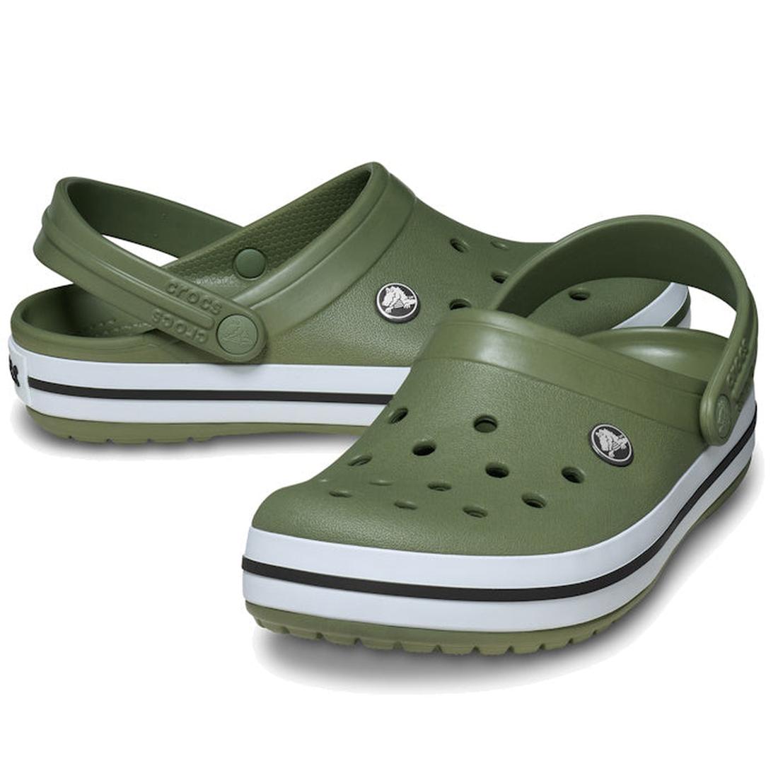 The Crocs Crocband Clog Cargo Green Mens Womens features ventilation holes, white and black striped midsoles, adjustable heel straps, and cushioned Croslite foam for all-day comfort.