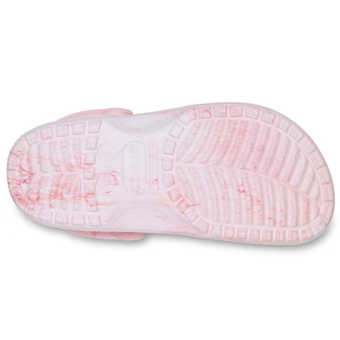 The image shows the bottom of a pink Crocs - Classic Watercolour Marbled Clog Guava Swirl with textured treads and visible dirt and red stains on its Croslite foam sole., 49756, 49757, 49758, 49759, 49760, 49761, 49762, 49763, 49756, 198445357503, 1984453