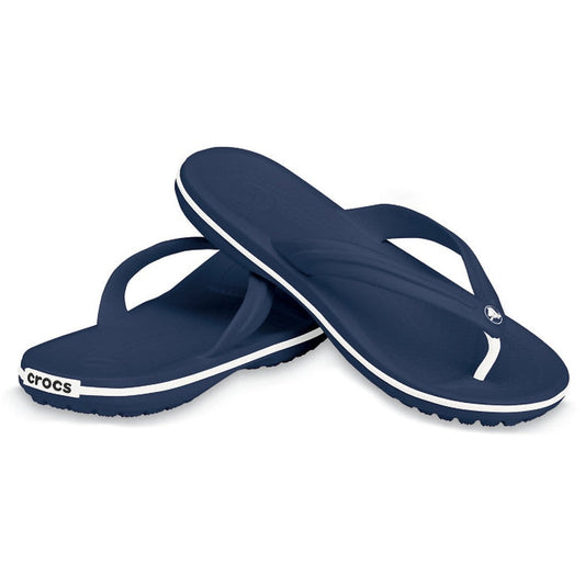 The Crocs - Crocband Flip Navy Adults womens & mens are navy flip flops with white soles and the Crocs logo on the strap. These unisex sandals are stacked and deliver signature lightweight comfort for daily wear.