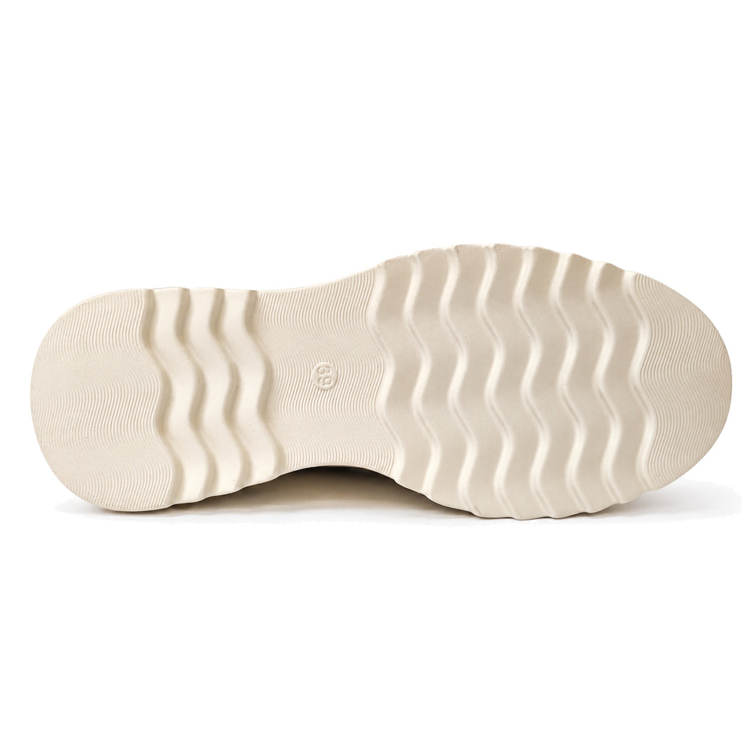 Bottom view of the Alfie & Evie Hosting Womens Leather Shoe in cream/gold, showing a beige sole with wavy ridges and a small central circle. This lightweight leather platform blends style and comfort., 38135, 9353738178833, 9353738178840, 9353738178857, 9