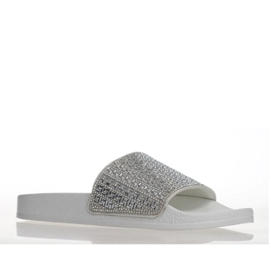 Alfie & Evie Billie Slide: a comfy white sandal with sparkling silver and gray gem strap, easy slip-on, cushioned support shown side view.  ksnz