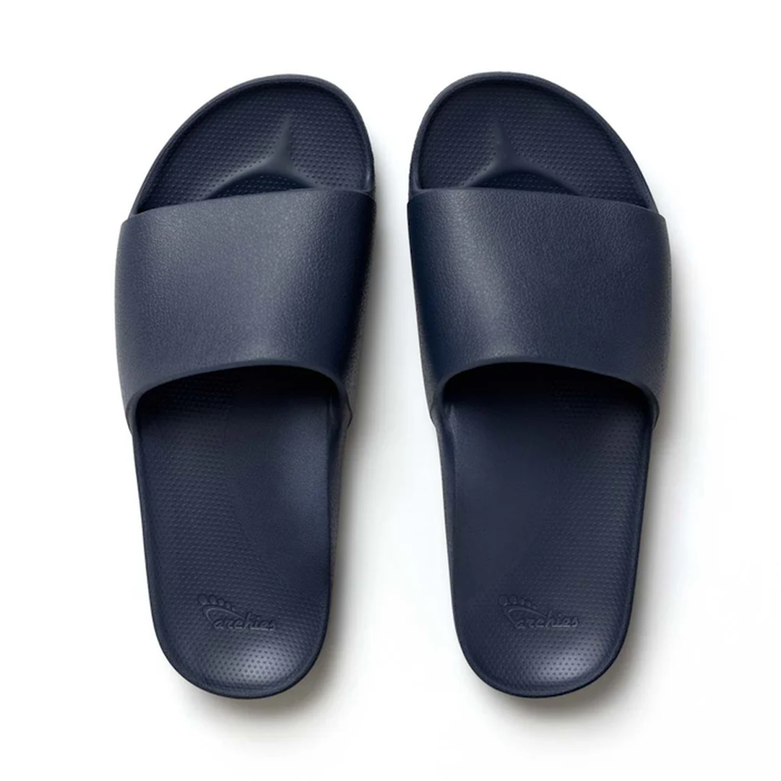 Archies Footwear Arch Support Slide Navy, comfy slides with textured soles and wide secure straps, in classic navy—perfect for busy families.  ksnz