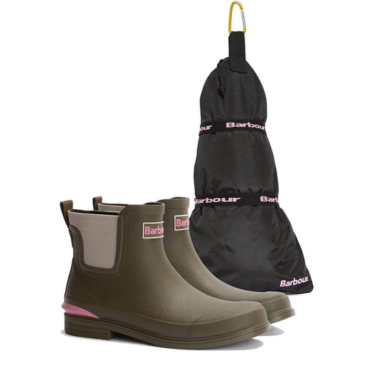 Barbour Abbeyfield Packable Ankle Wellingtons Olive feature pink accents and beige elastic sides, paired with a black Barbour carrying bag with yellow loop—lightweight and ideal for festivals.