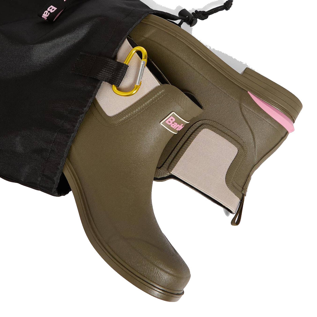 Barbour Abbeyfield Packable Ankle Wellingtons Olive with beige elastic sides, pink accents, yellow pull tab, and textured finish are shown partially pulled from a black drawstring bag. These lightweight wellies are easy to pack and stylish., 51830, 51831,