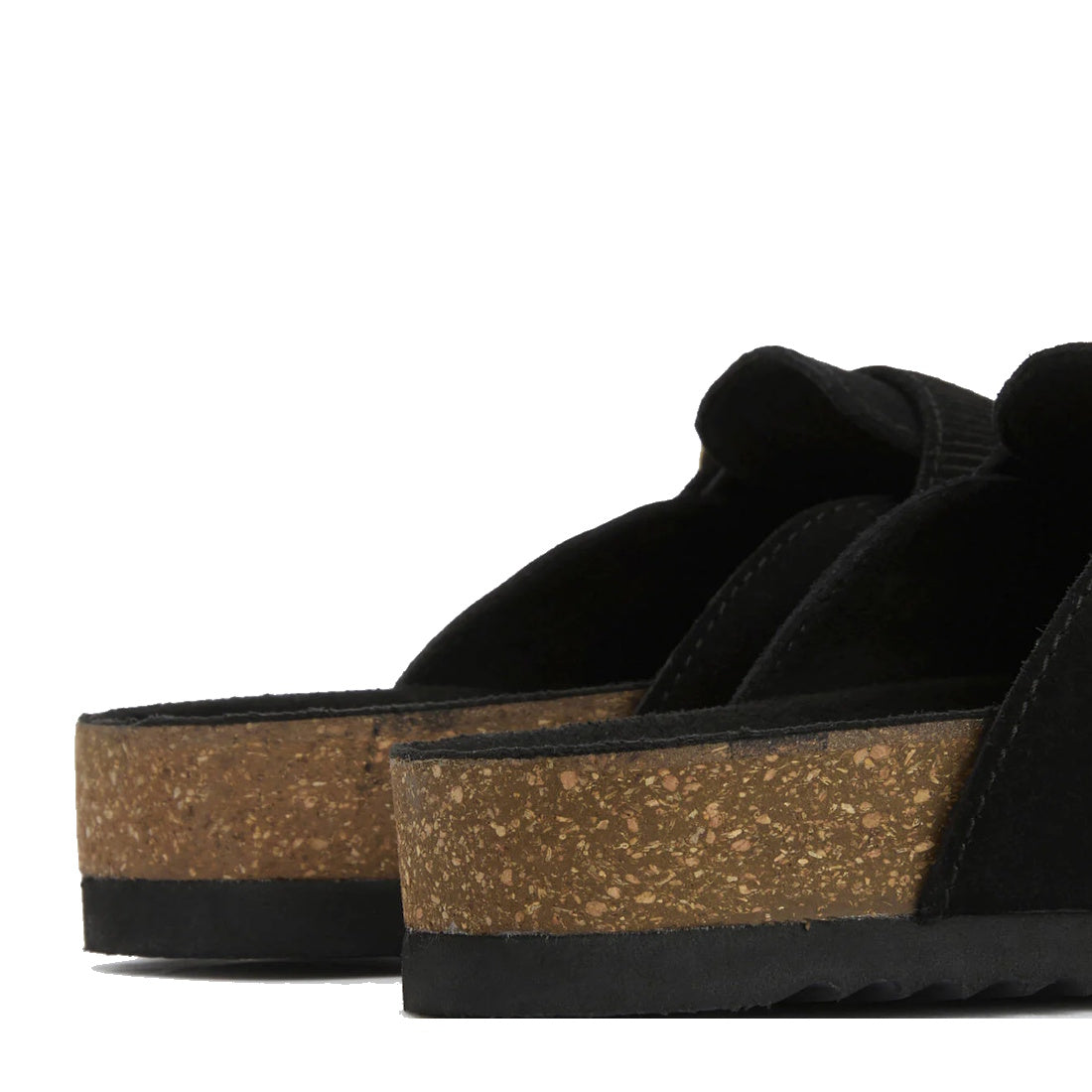 Close-up of the back and side profile of two Barbour Kyra Womens Closed Toe Clog Sandals in Black Suede, showing textured thick cork soles and suede uppers. The image highlights the heel details of these slip-on shoes., 5063669169339,
5063669169346,
50636