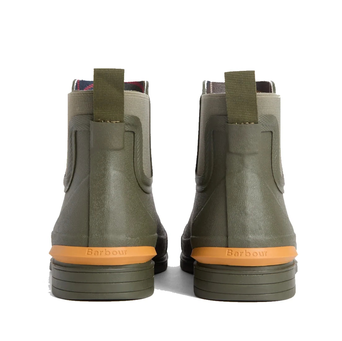 A pair of Barbour Abbeyfield Packable Ankle Wellingtons in olive are pictured from the rear, featuring tan soles with brown heel sections embossed with the Barbour brand name and pull tabs at the back. These lightweight ankle wellies combine practicality 