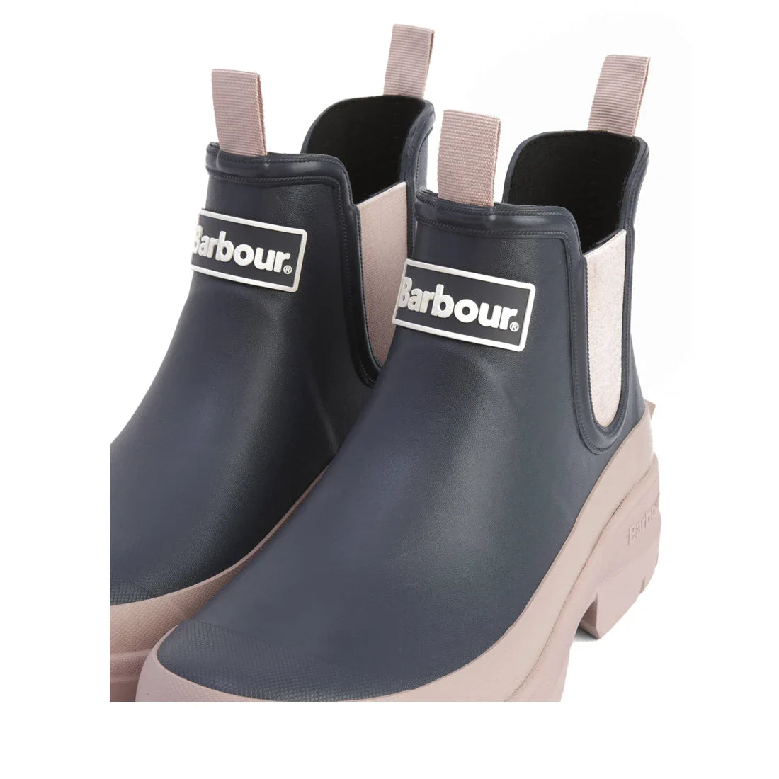 Barbour Nimbus Dusky Grey/Gardenia Pink Chelsea Wellingtons Womens Rainboot are waterproof ankle boots with dusky grey uppers, gardenia pink soles and stretchy pink side panels. Chelsea boot-inspired, they feature a pull tab and Barbour logo on the front.