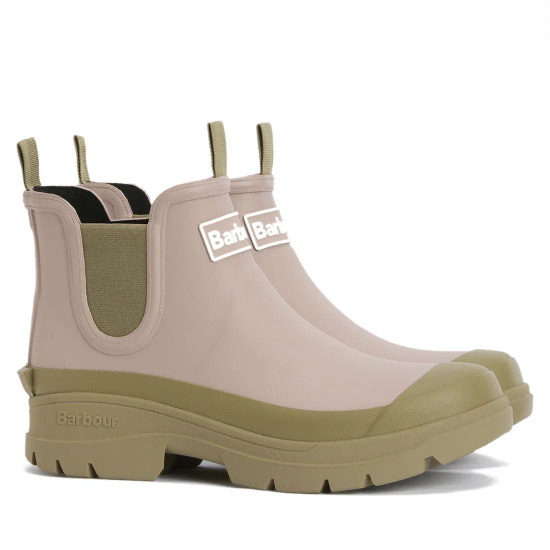Barbour Nimbus Gardenia Pink/Bleached Olive Chelsea Wellingtons for women feature waterproof construction, gardenia pink uppers with bleached olive soles and panels, pull tabs at front and back, elastic sides, and Barbour logo on the front.