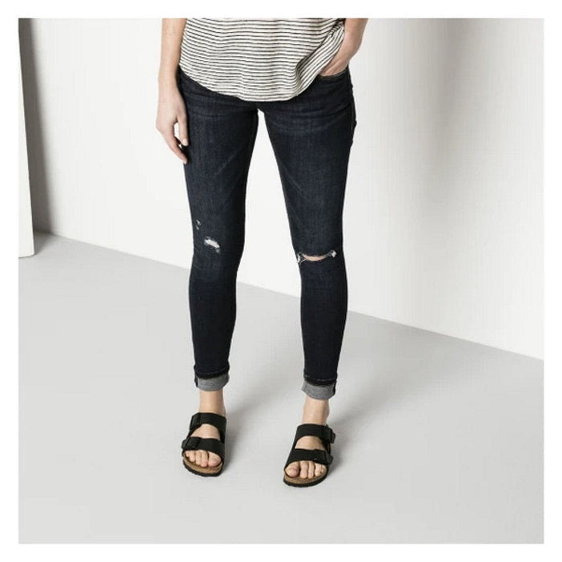 pair of birkenstocks on a womens feet. 2 strap arizona style with buckle fastening and regular width fitting.,
4013871020271,4013871007692,4013871021247,4013871023272,4013871027591,4013871033387,4013871035442,4013871048466,4013871054030,4013871058779,4013