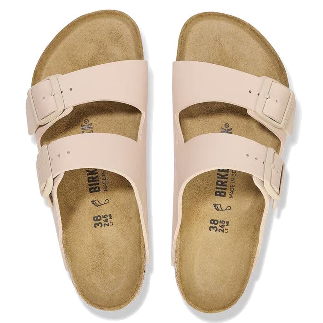 Pair of beige Birkenstock sandals on a white background, top down vew,
4066648430384,
4066648430421,
4066648430469,, 45662, 4066648430346, 4066648430384, 4066648430421, 4066648430469, 4066648430506, 45668, 45669, 45670, 45671, 45672, 45673