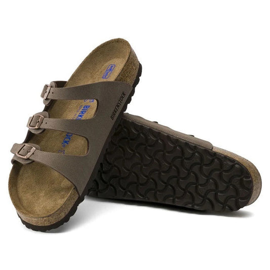 A pair of Birkenstock Florida Birko-Flor Birkibuc Regular Width Mocca Soft Foot Bed sandals with three adjustable straps and buckles, contoured soft footbed, and textured black soles; one upright, the other angled to reveal the sole.