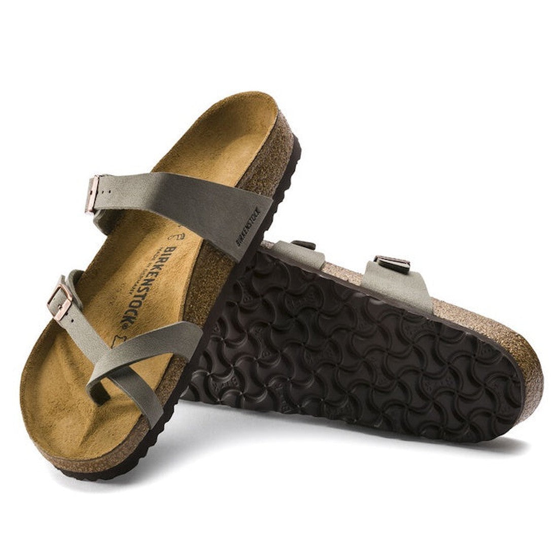 a pair of Birkenstock Mayari Birko Flor Birkibuc Earthy Stone Regular Width- thin strappy sandals with bubkle adjustment over the foot and on the outside of the foot near the toe area. Straps cross cross over the toes and a separate strap over the top of 