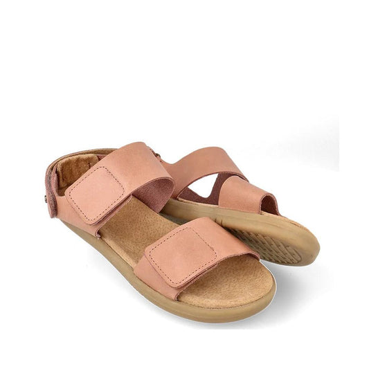 The Bobux Kid+ Plus Italian Clay Coast Open Toe Sandal 851201 is a pair of tan, breathable sandals with adjustable hook-and-loop straps and flat rubber soles, shown against a white background.