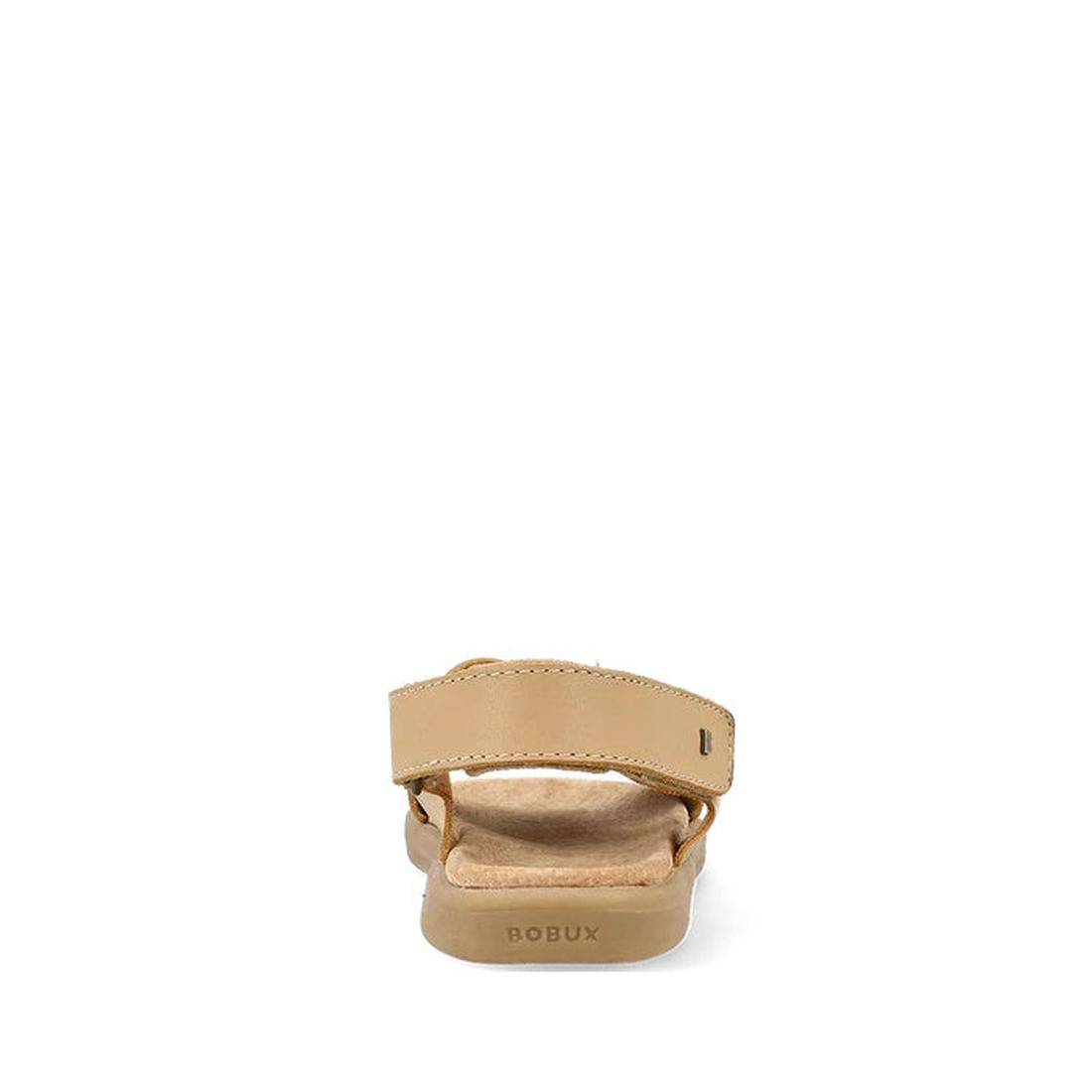 Rear view of the Bobux Kid+ Plus Glide Parchment Beige Open Toe Sandal, featuring a single strap, adjustable heel strap, and cushioned insole. The BOBUX logo appears on the sole, emphasizing these stylish kids leather sandals., 9420075773110, 942007577995