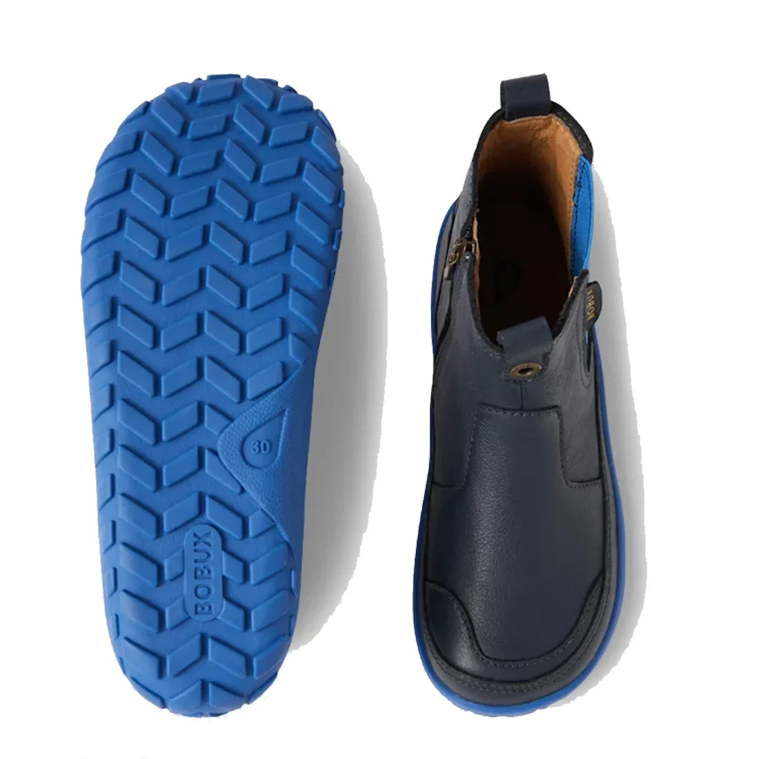 The Bobux KP Kids Plus Trail Navy Leather Boot Juniors Alpha features navy leather, bright blue zero-drop soles, a barefoot-shaped toe box, and a textured sole with the Bobux brand name; one boot is side-viewed, another shows the sole pattern., 9420068563