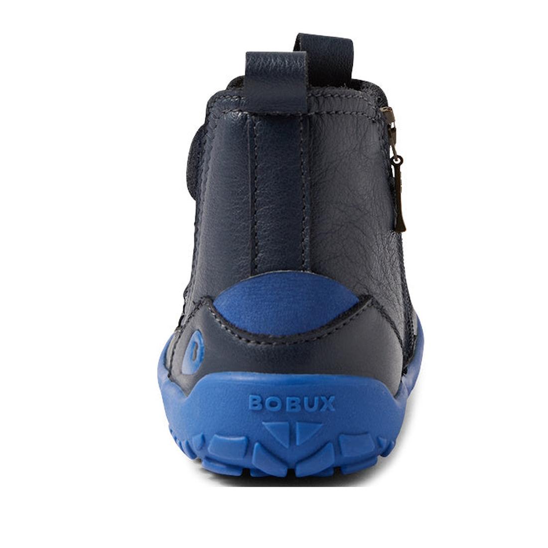 Rear view of the Bobux IW Iwalk Trail Leather Boot Navy Alpha for kids, featuring a barefoot-shaped toe-box, bright blue zero drop sole, side zipper, and BOBUX embossed on the heel; displayed on a white background., 9420068563568, 9420068563575, 942006856