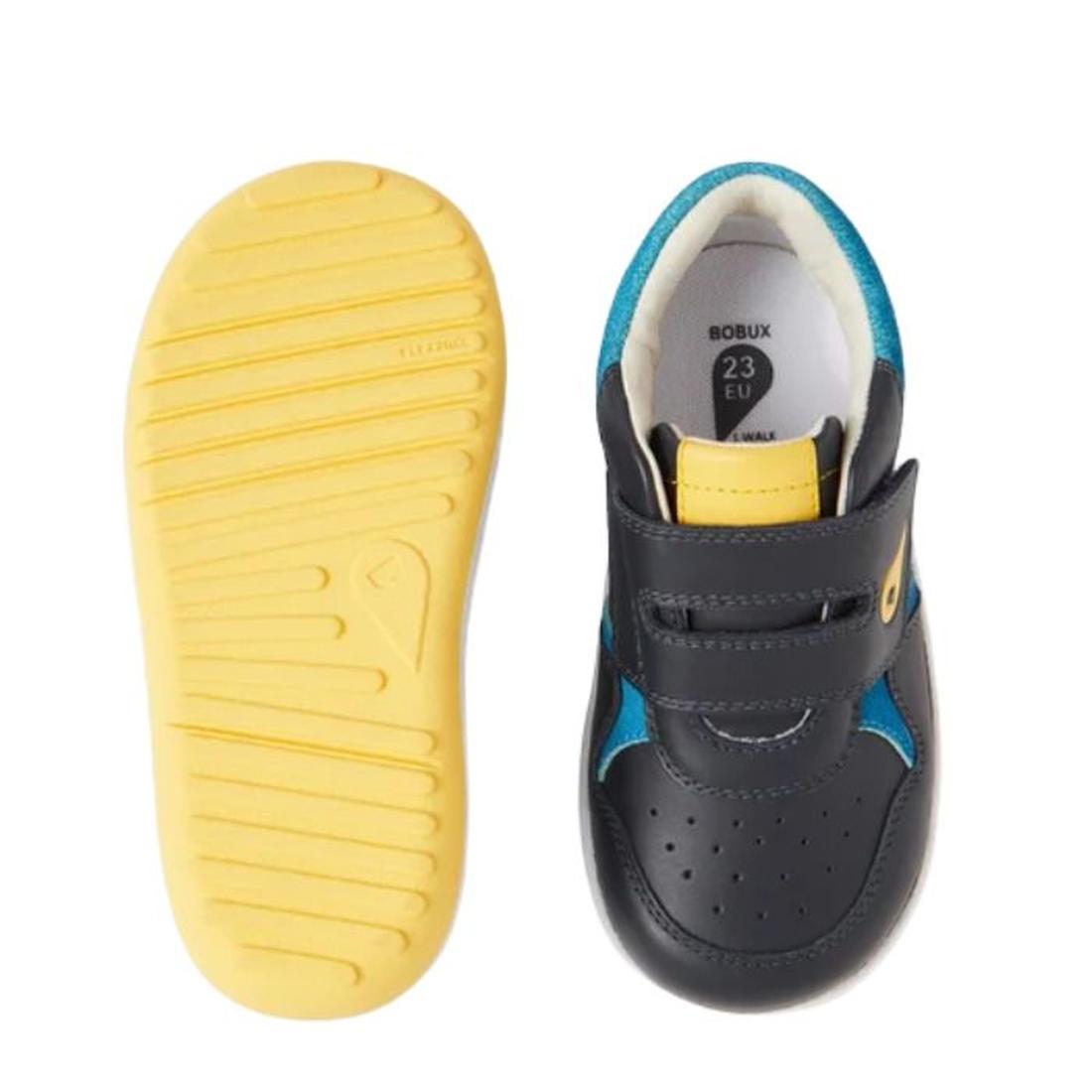 The Bobux IW Iwalk Baseline Leather Mid Sneaker in navy features yellow and blue accents. Shown are a toddler pair: one displays the hook-and-loop strap from the top, the other reveals its textured yellow sole from below., 9420074818560, 9420074818577, 94