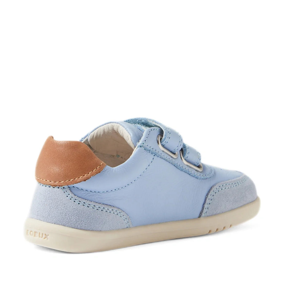 The Bobux IW Iwalk Toddlers Champ Leather Sneaker in Skyway Blue is featured here with suede and leather textures, a tan accent on the heel, hook-and-loop straps, and a cream rubber sole, shown from the back-left angle., 9420074856753, 9420074856760, 9420