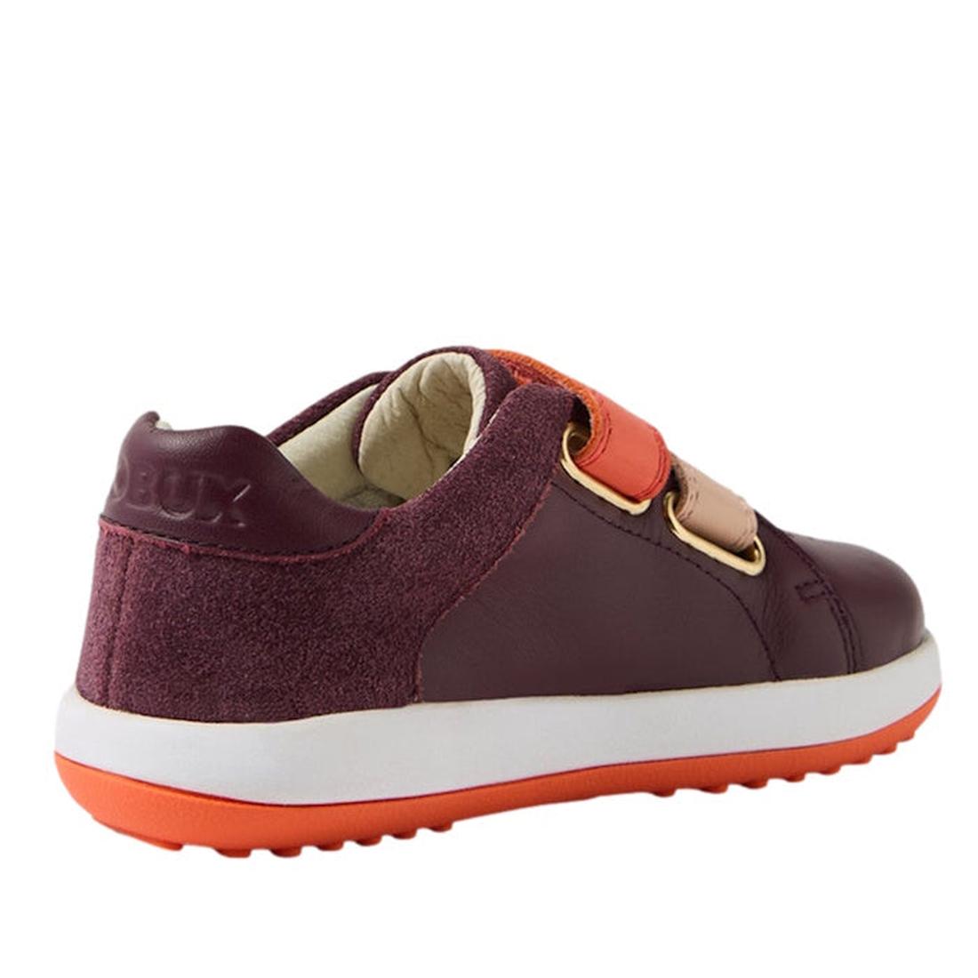 The Bobux IW Iwalk Breakpoint Leather Fig Purple is a kids' leather sneaker with a maroon and suede upper, orange and pink Velcro straps, and an orange rubber sole. Shown from a rear side angle on a white background., 9420074817600, 9420074817617, 9420074