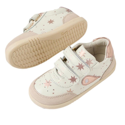 Bobux Toddlers IWalk IW Champ II Sneaker Star Chalk White Rose Gold: Cream leather sneakers for kids with pink star and heart patterns, beige soles, pink suede details, and adjustable velcro straps. Shown from side and bottom on a white background.