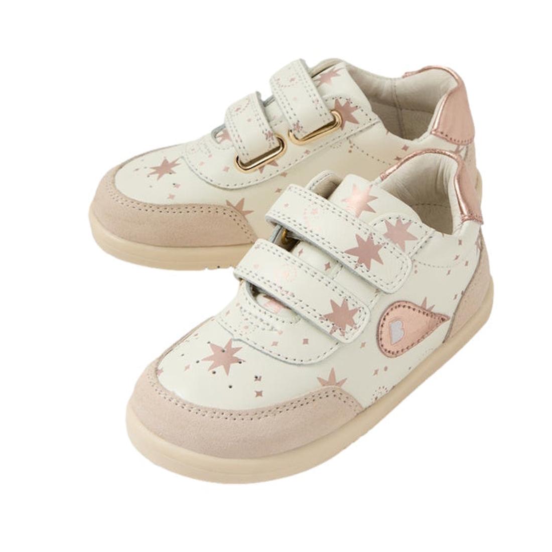 The Bobux Toddlers IWalk IW Champ II Sneaker Star in Chalk White/Rose Gold features cream uppers, beige soles, pink star patterns, pink accents, leather material, two Velcro straps, and rounded toes for comfort., 9420074865489, 9420074865496, 942007486550