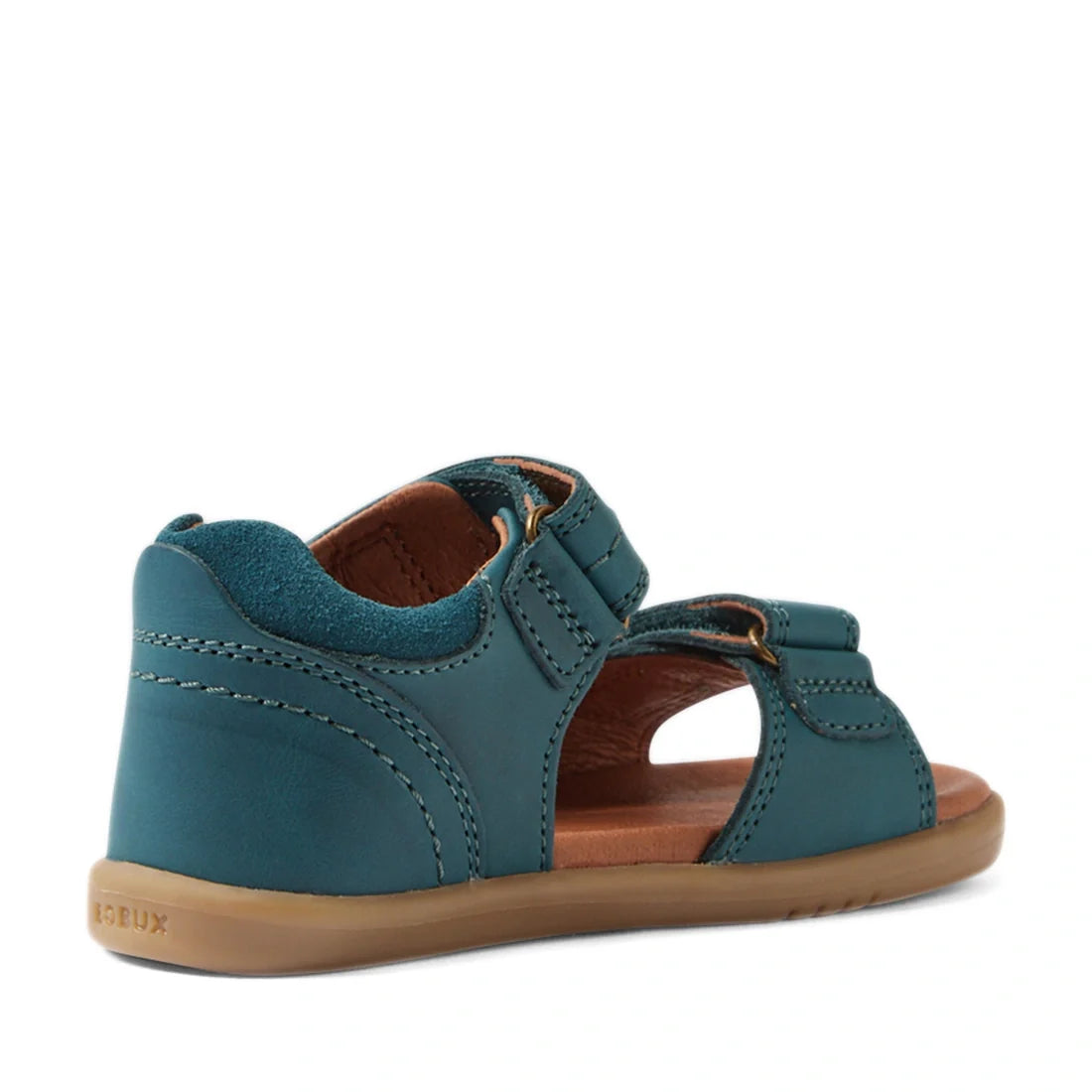 A Mediterranean green children’s sandal—Bobux IWalk Driftwood Sandal Mediterrainean Green Open Toe—inspired by the classic Driftwood design, features a closed heel, open toe style, and adjustable straps. Viewed from the back side angle, these toddler boys