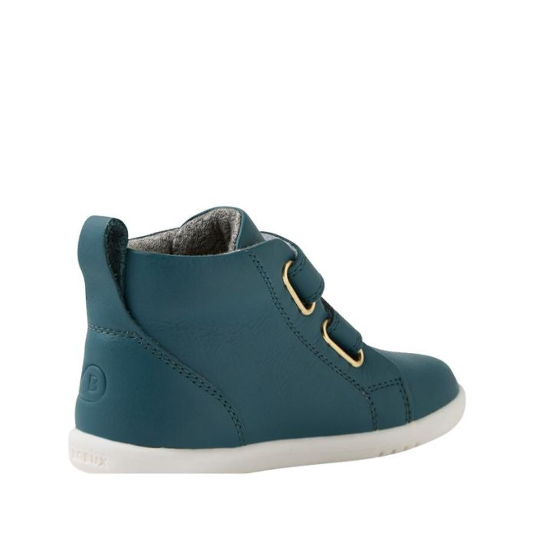 The Bobux IW Iwalk Grass Court Hi Leather Boot in Mediterranean Green is a kids’ high-top leather sneaker with adjustable straps, gold eyelets, white rubber sole, and subtle stitching, shown from the side on a white background., 9420074856814, 94200748568