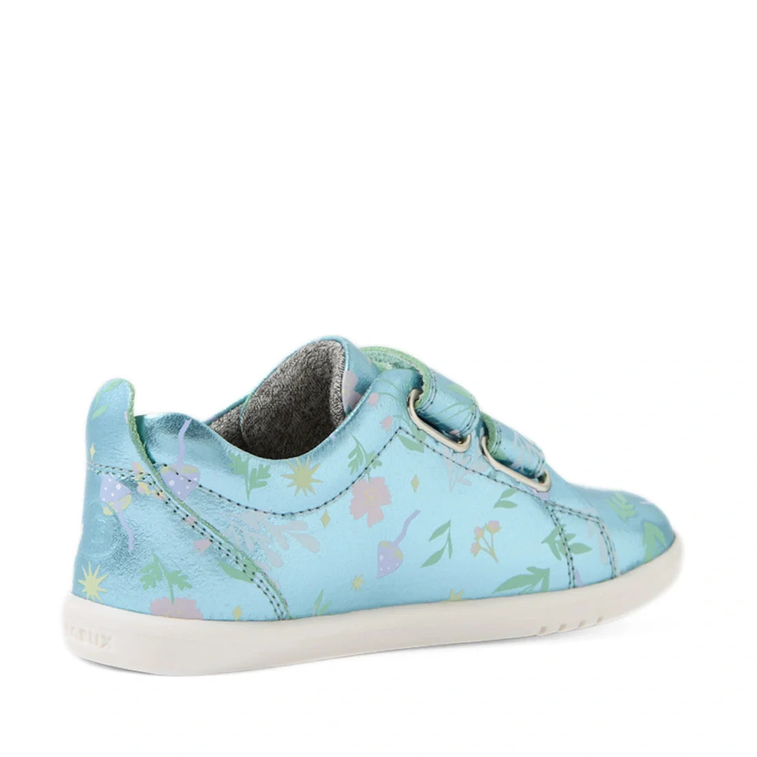A Bobux Iwalk Toddlers Grass Court Jelly Mint Metallic Leather Trainer in blue, featuring a light blue upper with gray lining and two hook-and-loop straps, is shown from the back left side against a white background., 9420074806833, 9420074806840, 9420074