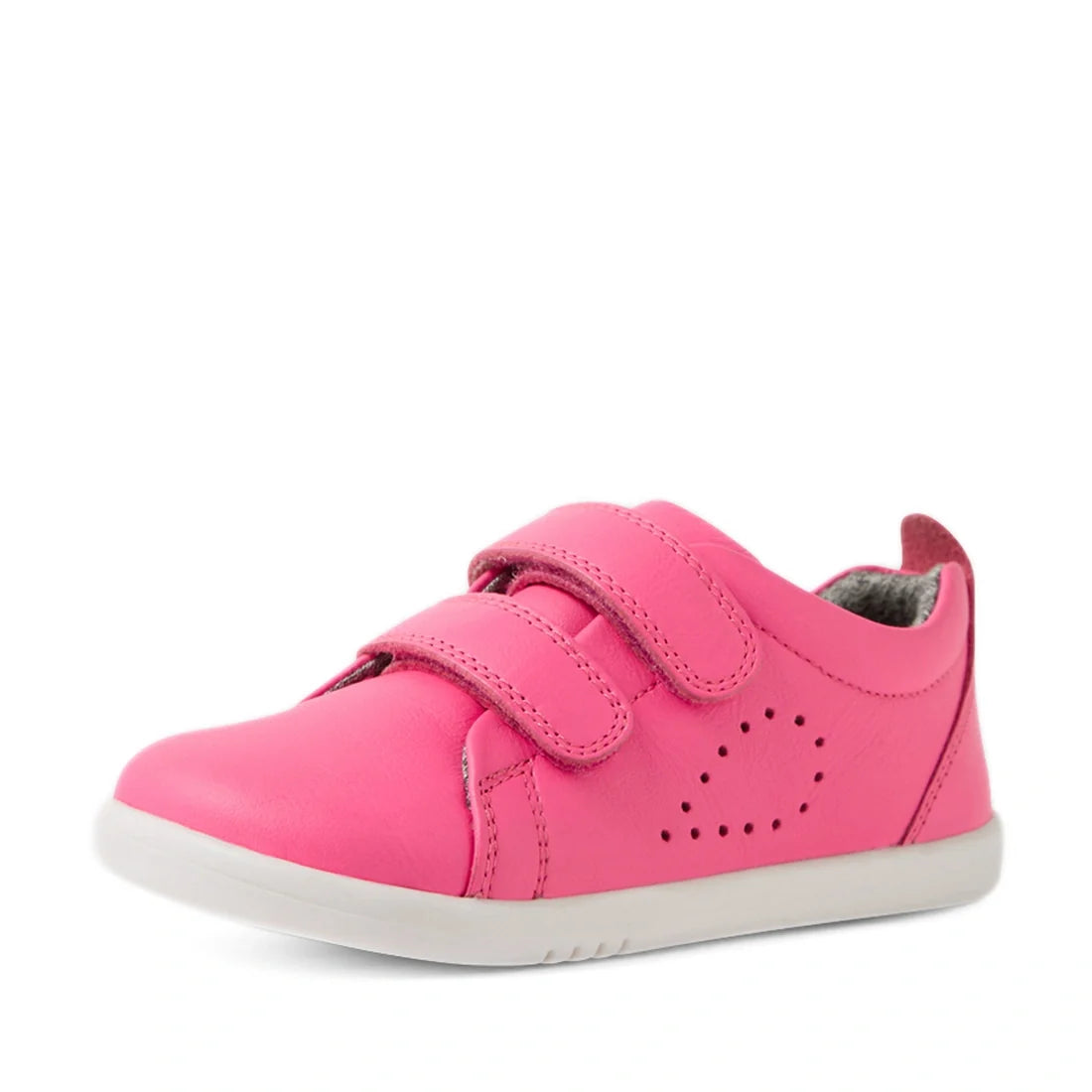 The Bobux Iwalk Toddlers Grass Court Pink Lemonade Leather Trainer features a bright pink leather upper with two Velcro straps, small decorative perforations on the side, a white sole, and a grey inner lining, displayed against a plain white background., 