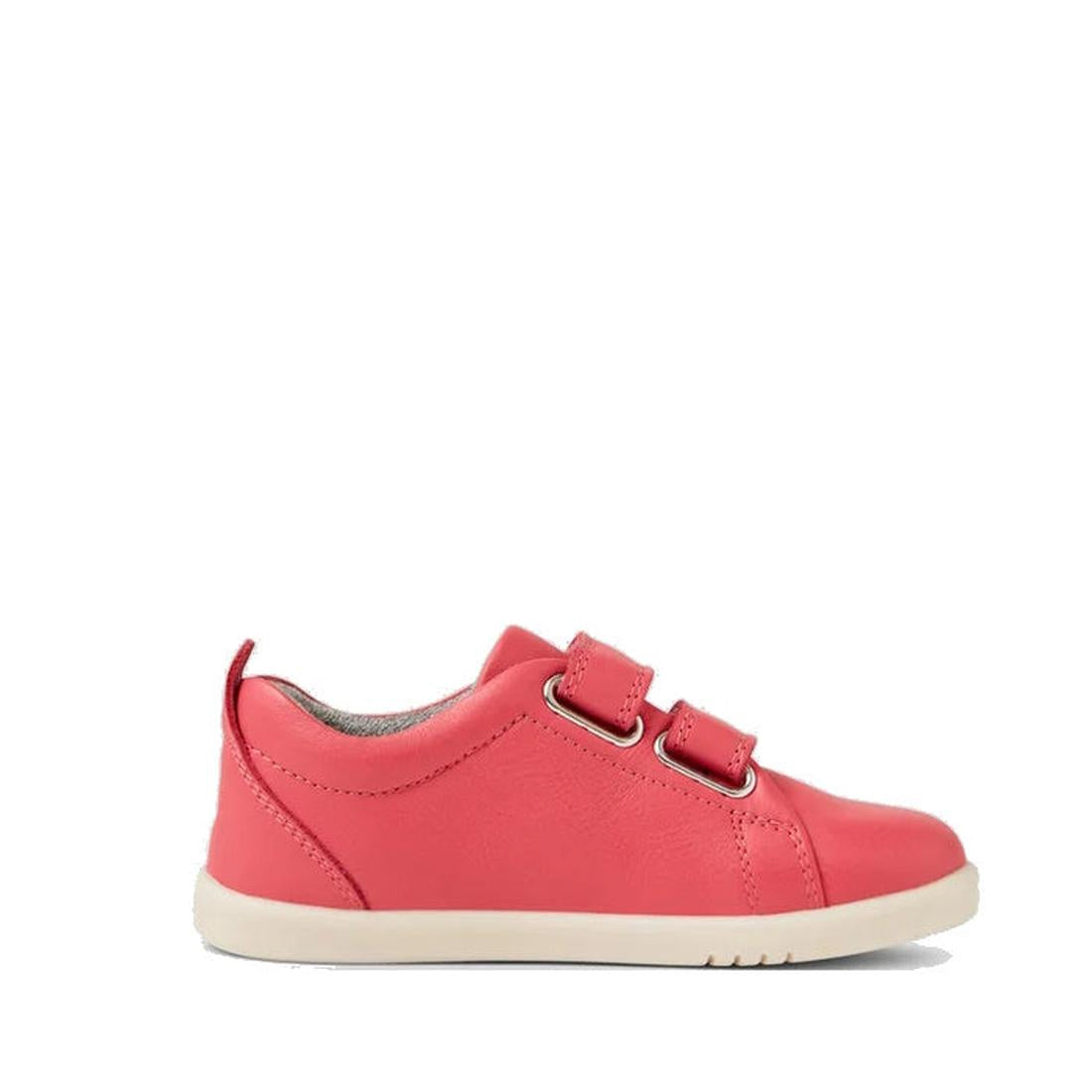 A single Bobux IW Iwalk Grass Court Leather Sneaker in Radiant Raspberry, featuring two Velcro straps and a white sole, is shown side-on against a plain background. Podiatrist-endorsed leather ensures comfort and style for toddlers., 9420068550902, 942006