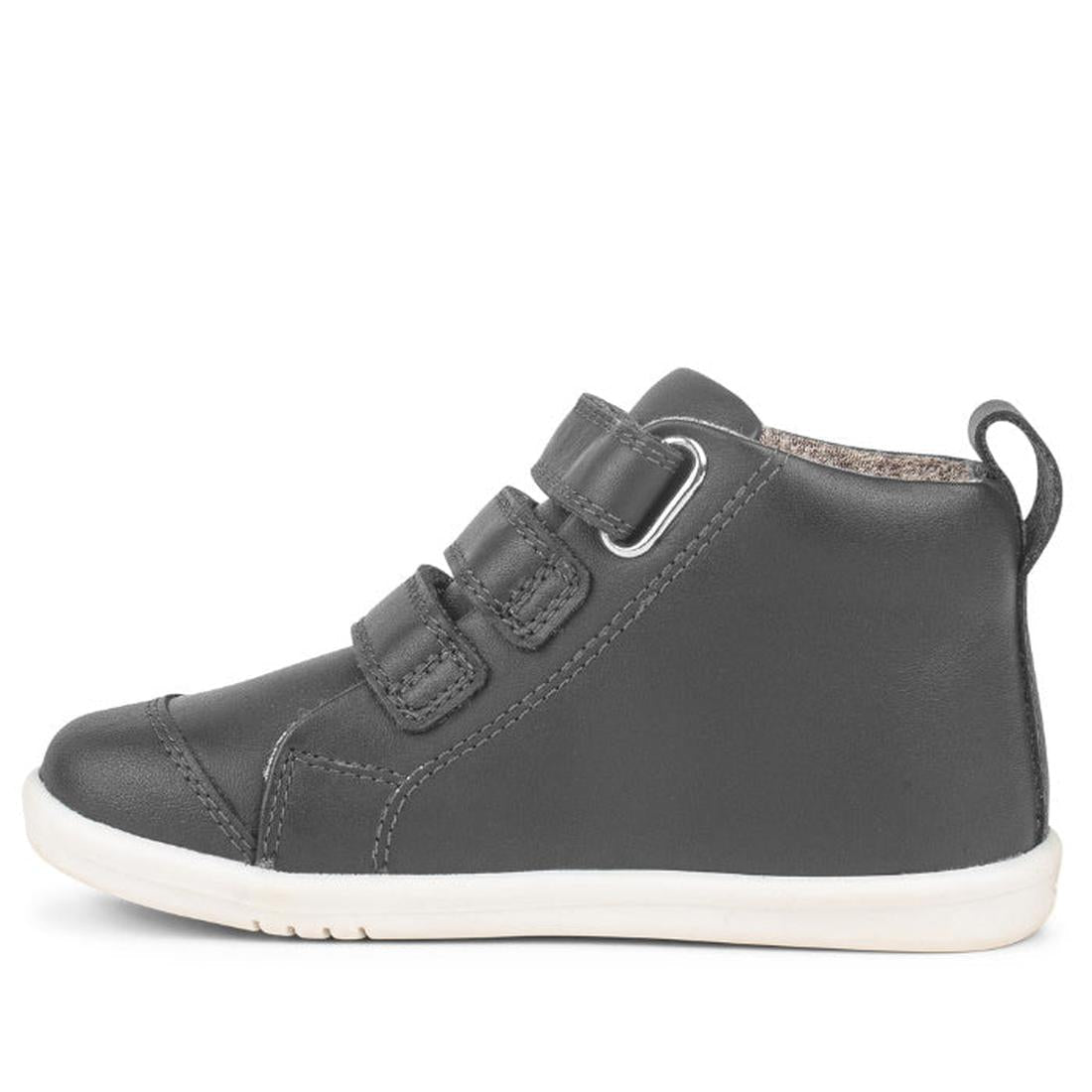 The Bobux IWalk IW Hi Court Boot in Smoke Grey features two velcro straps, premium coated leather, a white sole, and a back pull tab. This toddler shoe is shown in a side profile facing left., 9420071306299, 9420071306305, 9420071306312, 9420071306329, 94
