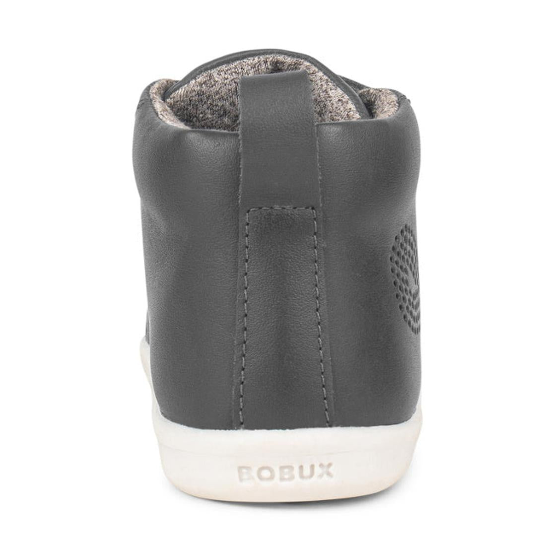 A back view of the Bobux IWalk IW Hi Court Boot in Smoke Grey, featuring a white sole, "BOBUX" embossed on the heel, a pull tab for easy wear, and crafted from premium coated leather for lasting quality., 9420071306299, 9420071306305, 9420071306312, 94200