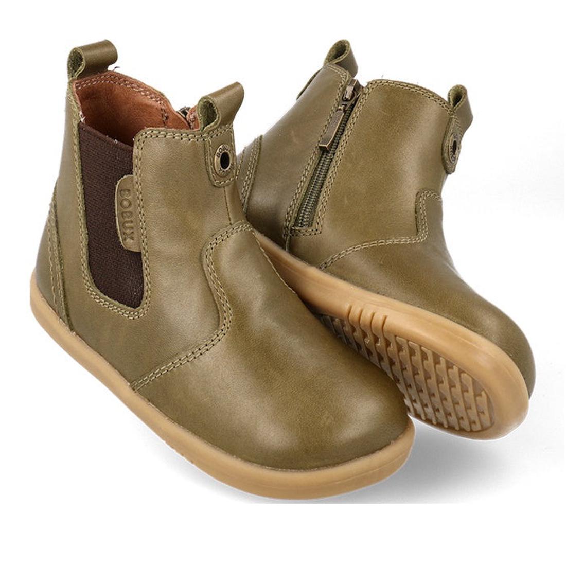 The Bobux Iwalk Jodhpur Ankle Boots Olive Toffee for kids feature leather uppers, tan rubber soles, elastic side panels, a side zipper, and front and back pull tabs for easy on and off.