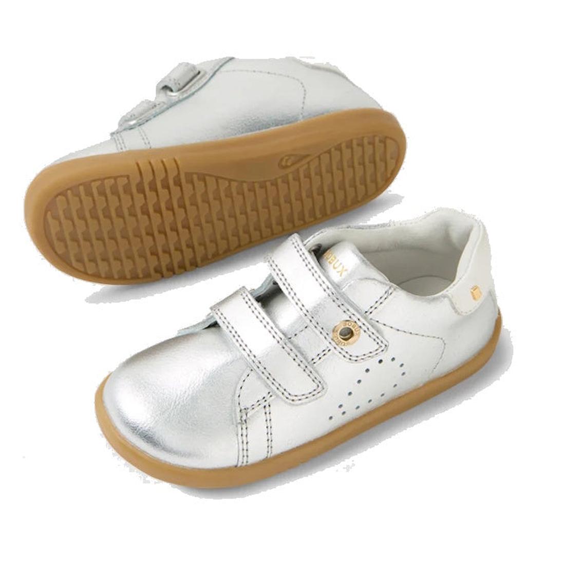 The Bobux IW Iwalk Maverick Leather Sneaker in silver features tan rubber soles and adjustable Velcro straps for kids, displayed from the side and bottom on a white background., 9420074836472, 9420074836489, 9420074836496, 9420074836502, 9420074836519