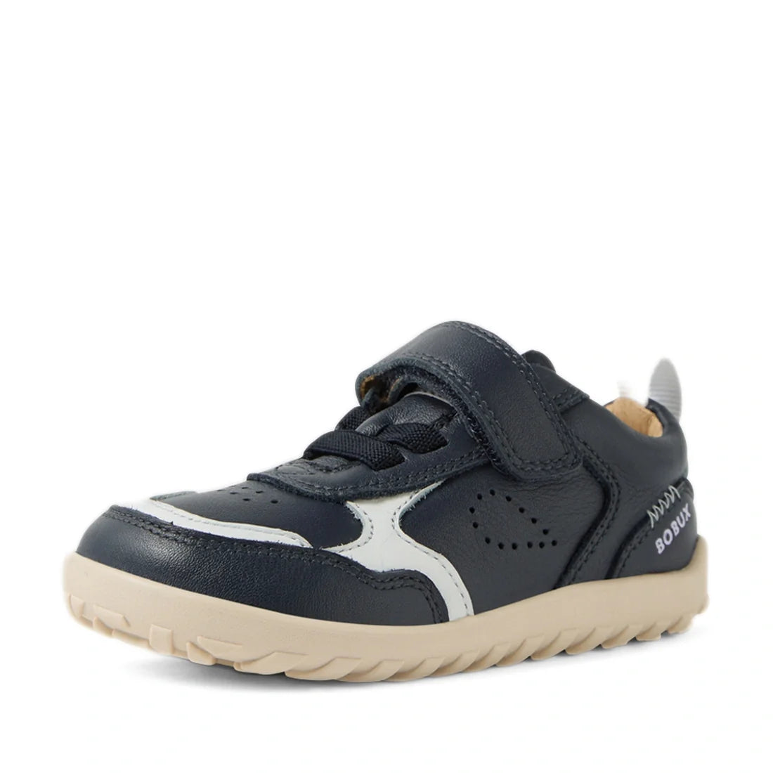 The Bobux IW Iwalk Neo Toddlers Leather Sneaker Navy Barefoot is a navy blue and white toddler leather sneaker with a beige sole, Velcro strap, decorative stitching, and a zero drop sole for natural foot movement, shown on a white background., 94200748547
