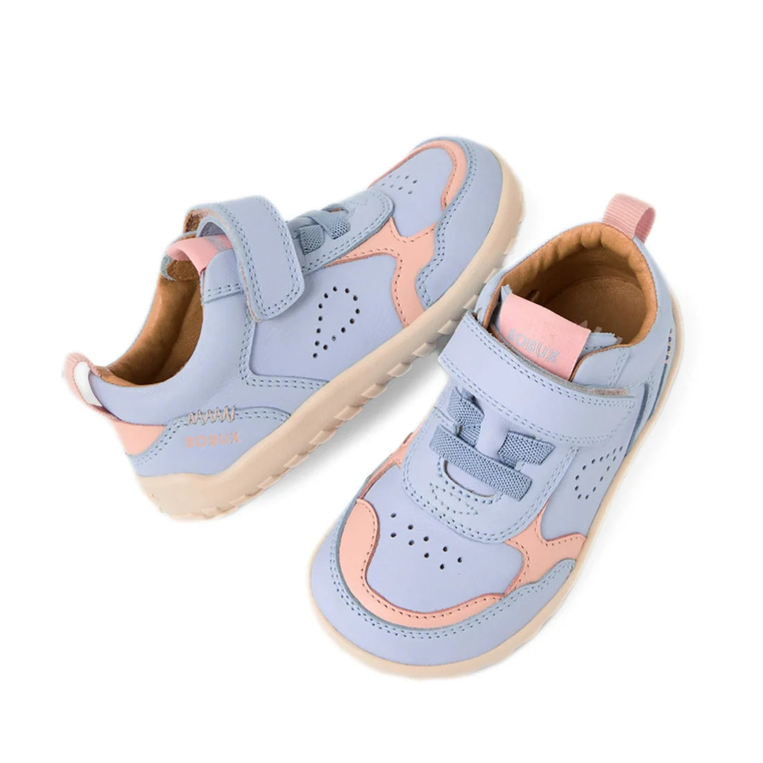 A pair of Bobux IW Iwalk Neo Toddlers Leather Sneakers in Skyway Blue with light blue and pink accents, featuring Velcro straps, perforated detailing, and beige zero drop soles, displayed on a white background.