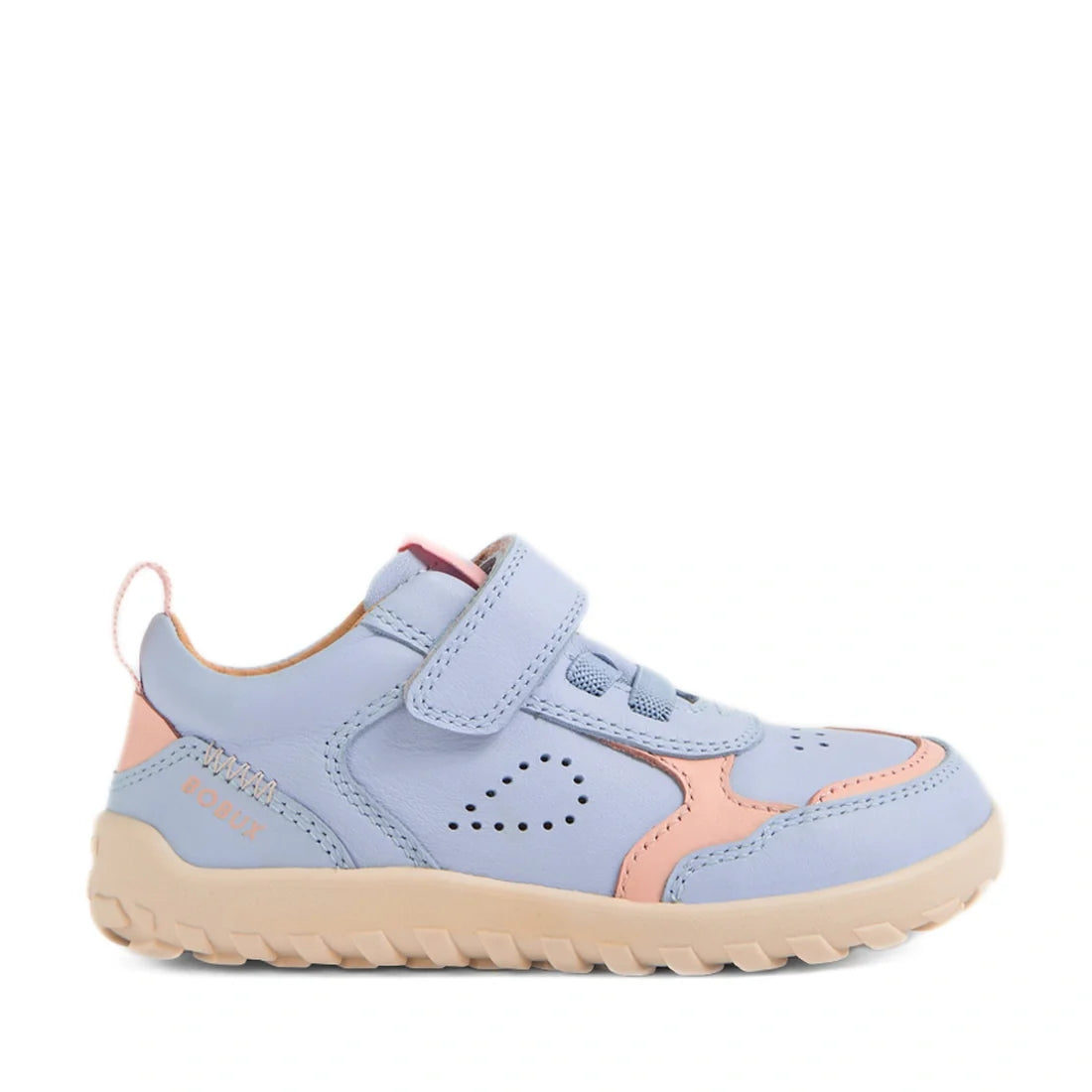 The Bobux IW Iwalk Neo Toddlers Leather Sneaker in Skyway Blue features a barefoot-inspired design with a light blue leather upper, peach accents, beige sole, perforated side detail, and a rounded toe. It offers a single hook-and-loop strap closure and a 
