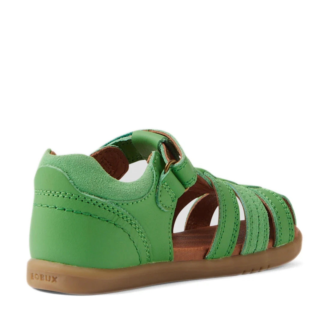 The Bobux IWalk Roam Sandal Retro Green Closed Toe for toddlers showcases a stylish and functional design with a closed heel, open toes, multiple straps, and easy velcro fastening—making it an ideal summer shoe for kids. Its sole is light brown with “BOBU