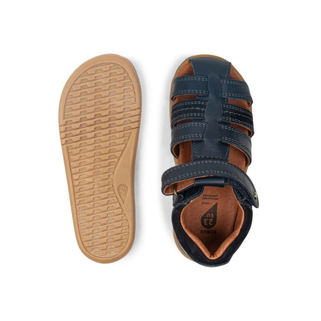 image of 2 bobux i-walk roam sandals in navy. 1 showing the sole ane the other a top down of the style showing the heel suport, protective toe covering an brown coloured foot bed. also shows the single velcro strap that fastens around the ankle., 94200620