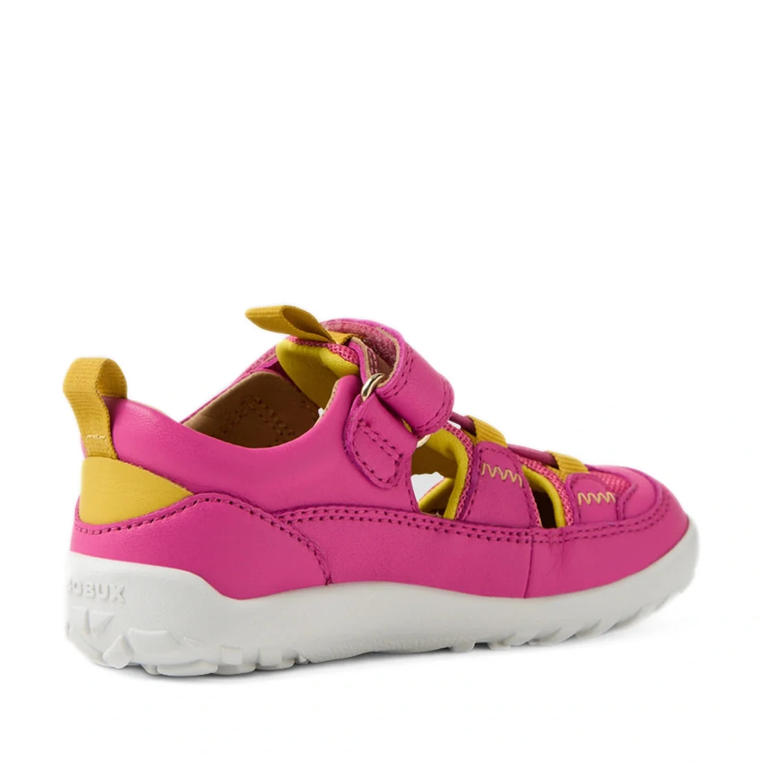The Bobux IW Iwalk Rocky Rose Violet Bright Pink Closed Toe Sandal Barefoot features a pink and yellow color scheme with a white sole, velcro strap, and cut-out design—these kids’ leather sandals are shown from the back and side against a white background