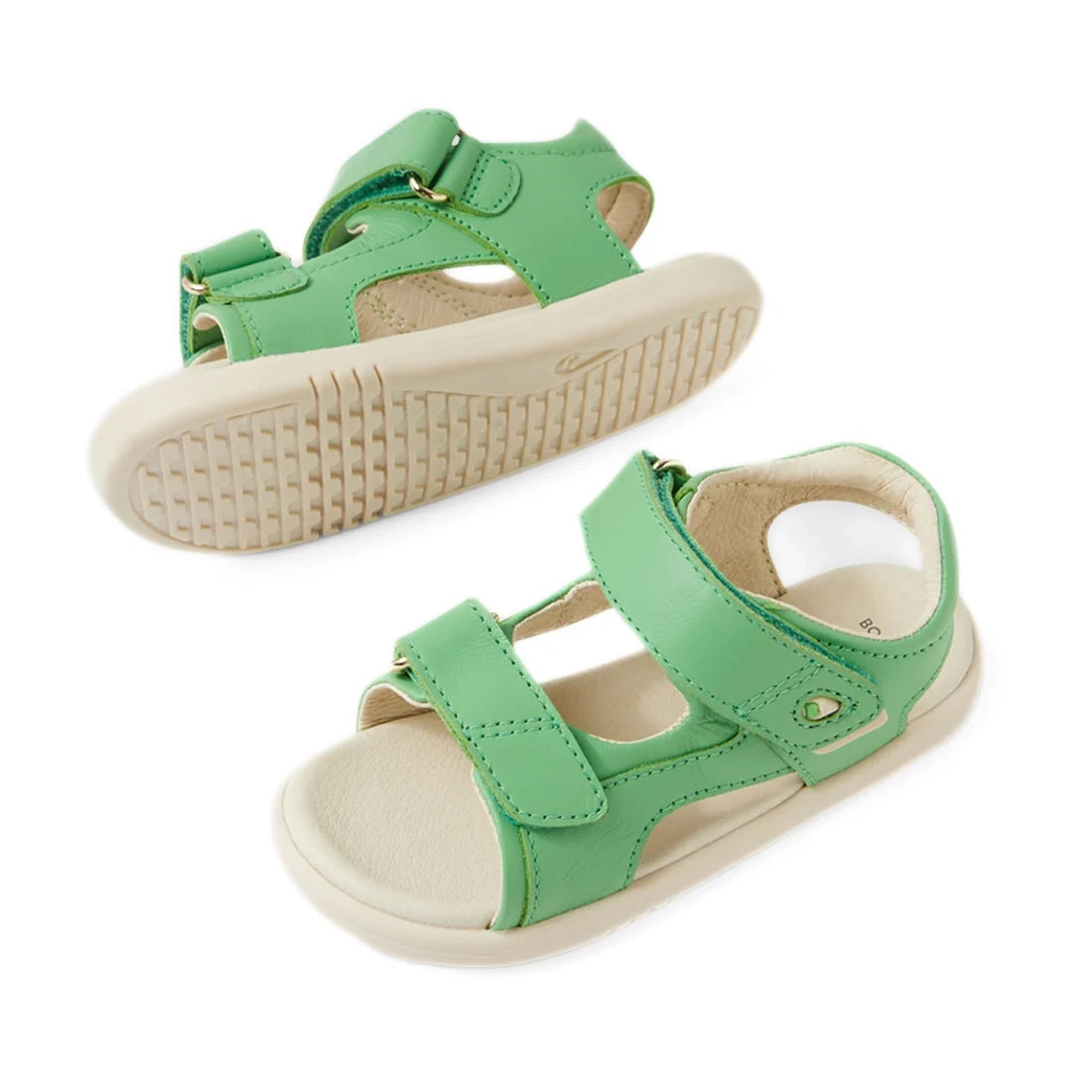 A pair of Bobux IWalk Strand Sandal Retro Green Open Toe toddlers leather sandals with beige soles, featuring adjustable straps and open toes, displayed on a white background., 9420074857705, 9420074857712, 9420074857729, 9420074857736, 9420074857743