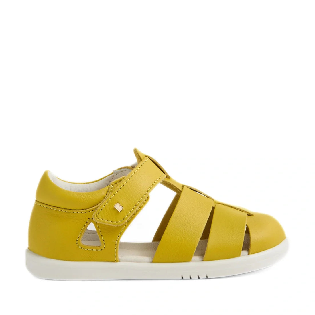 Featuring a closed toe, white sole, Velcro strap, and fun geometric cutouts on the sides, the Bobux IWalk Tidal Sandal Mango Mint Closed Toe Toddlers is crafted from water-friendly leather in a vibrant yellow—perfect for keeping little feet comfortable an