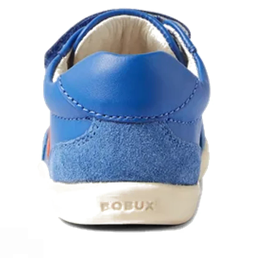 Rear view of the Bobux IW Iwalk Champ Sneaker Olympian Blue, featuring blue leather, adjustable hook-and-loop straps, suede heel, white cushioned interior, and "BOBUX" embossed on the white rubber sole., 9420068552593, 9420068552609, 9420068552616, 942006